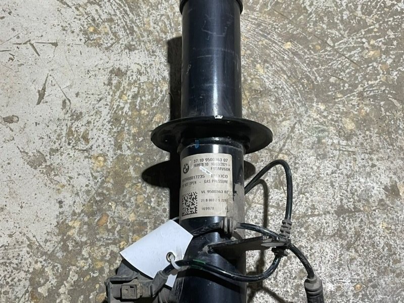 Амортизатор передний левый