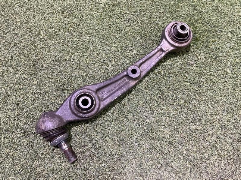 Рычаг передний левый