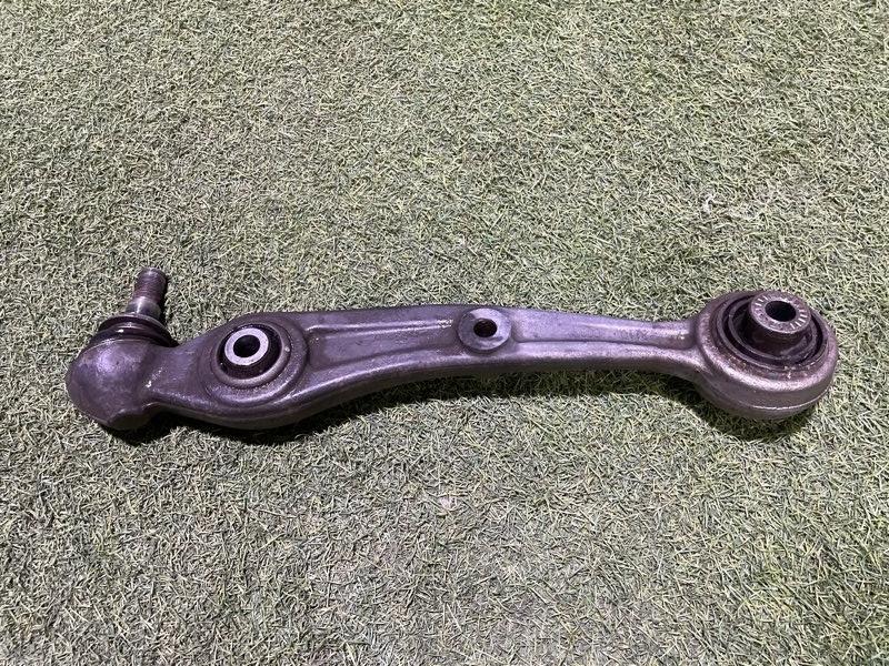 Рычаг передний левый