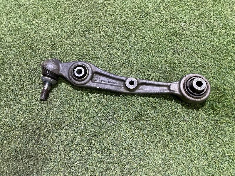 Рычаг передний левый