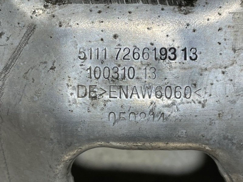 Кронштейн усилителя переднего бампера левый