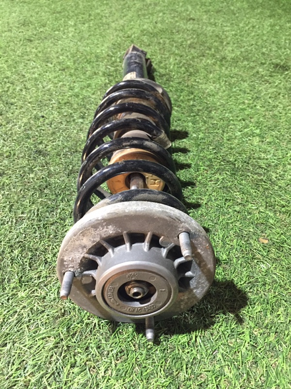 Амортизатор задний левый