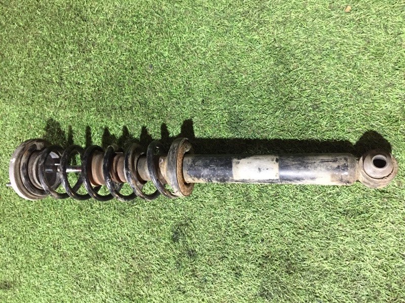 Амортизатор задний левый