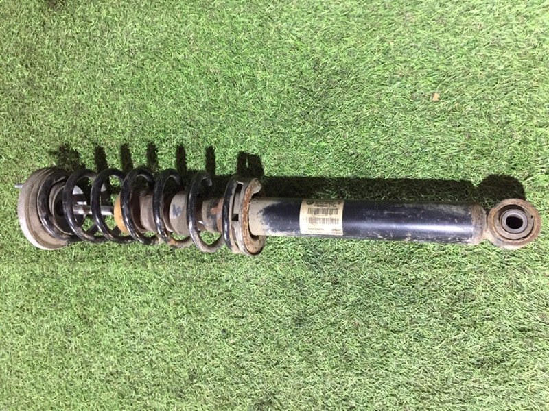 Амортизатор задний левый