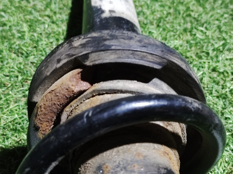 Амортизатор задний левый