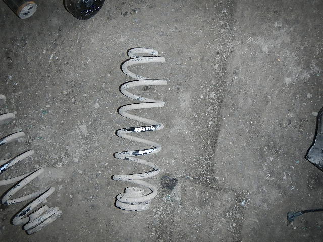 Пружина задняя