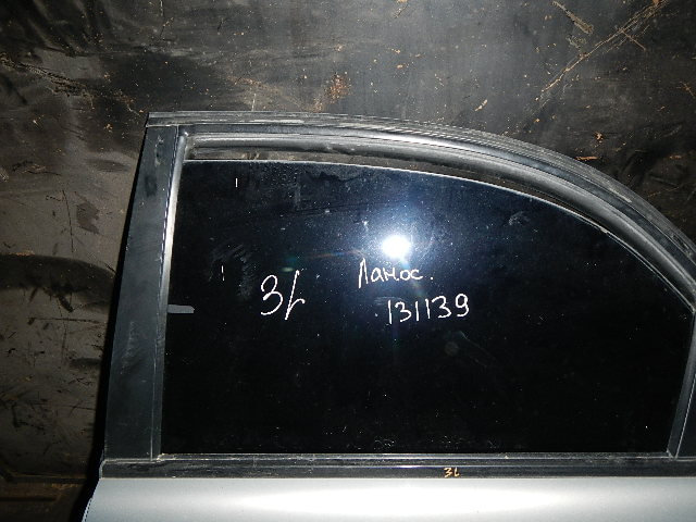 Стекло двери задней левой