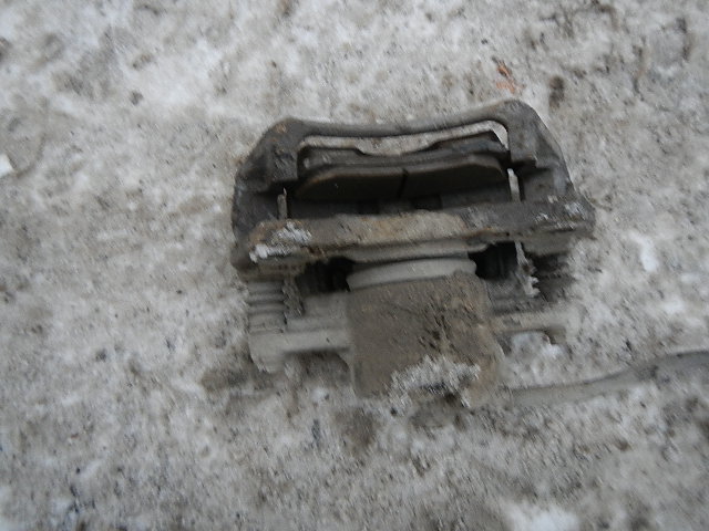 Суппорт передний левый