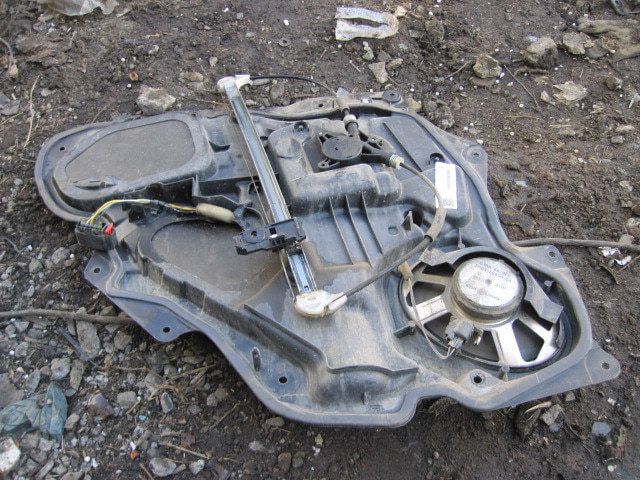 Стеклоподъемник электр. задний левый