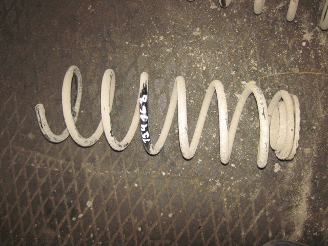 Пружина задняя