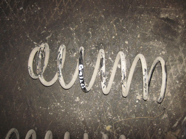 Пружина задняя