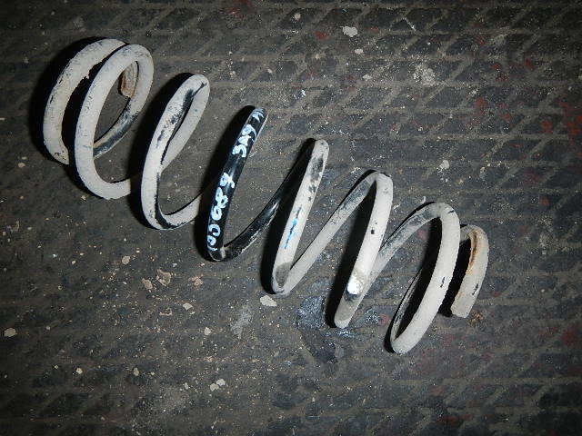 Пружина задняя