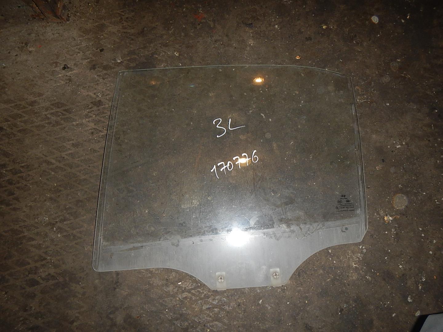 Стекло двери задней левой