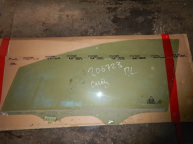 Стекло двери передней левой