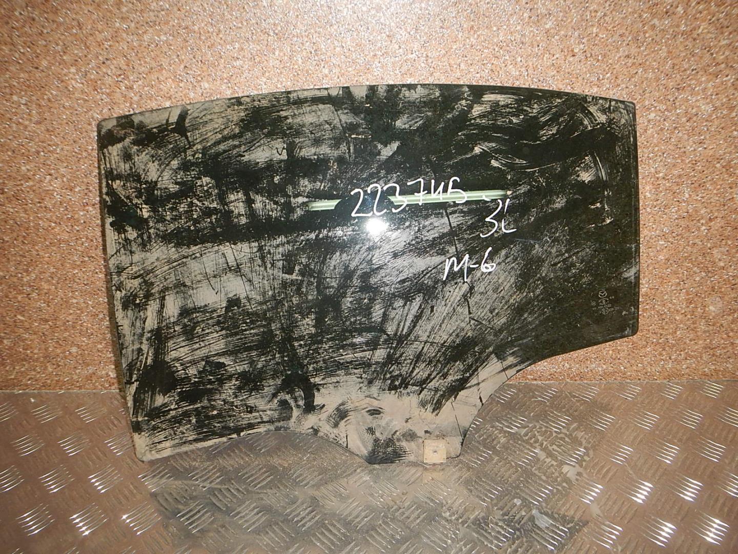 Стекло двери задней левой