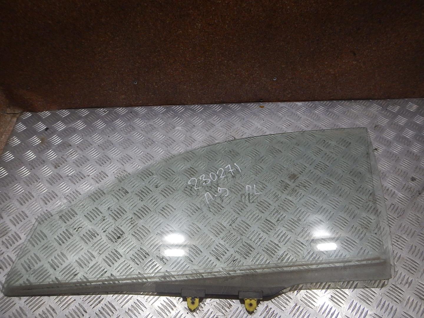 Стекло двери передней левой