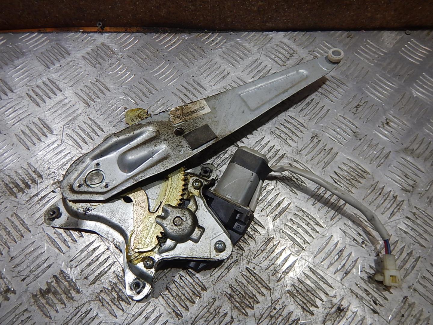 Стеклоподъемник электр. задний левый