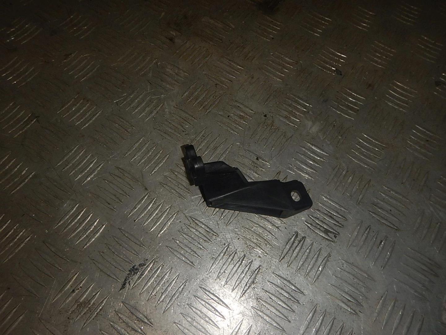 Кронштейн фар левый