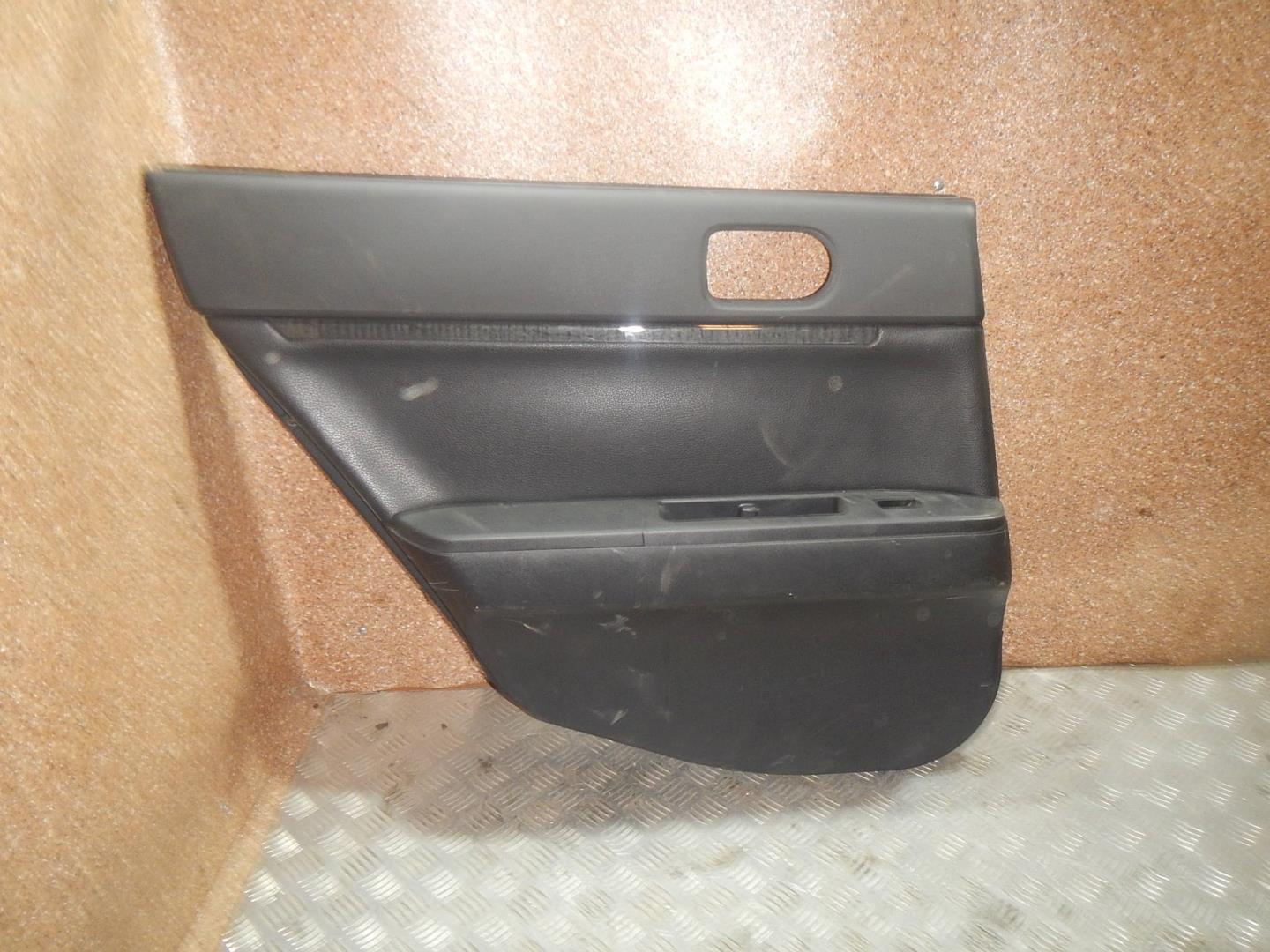 Обшивка двери задней левой