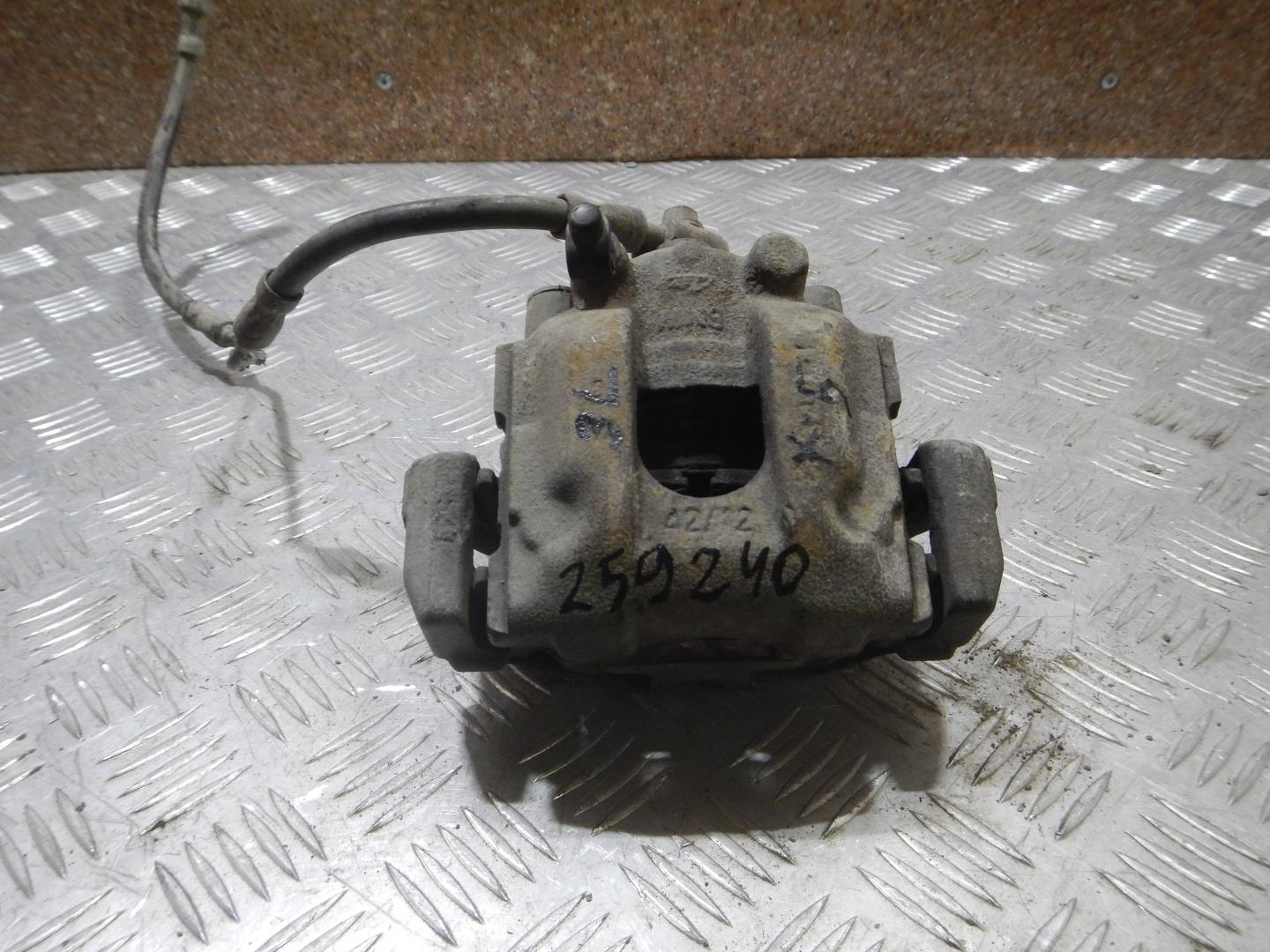 Суппорт задний левый