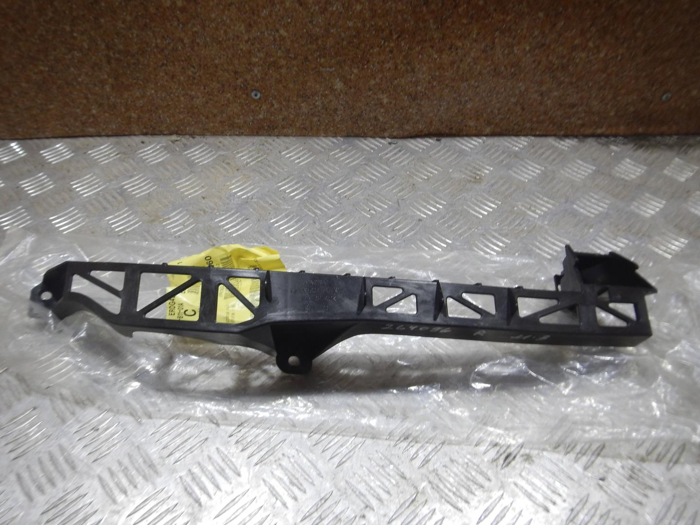 Кронштейн фар правый