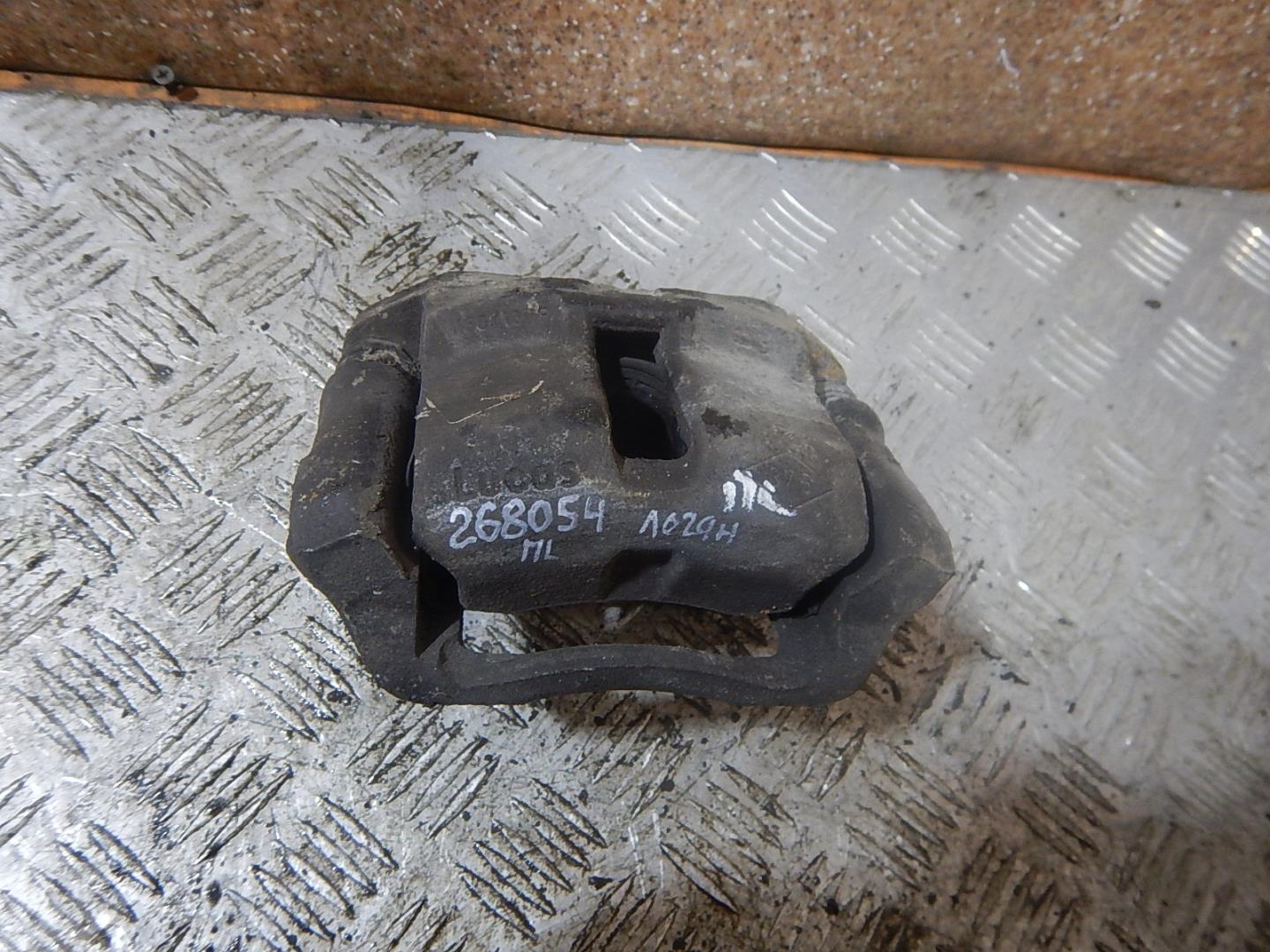 Суппорт передний левый