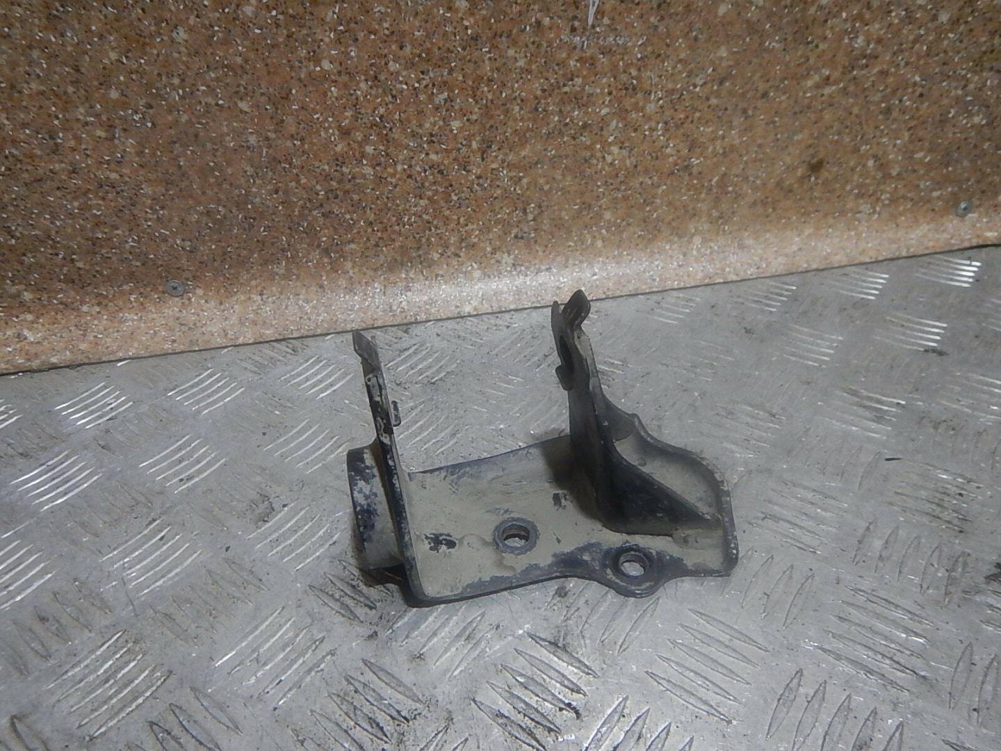 Кронштейн КПП левый