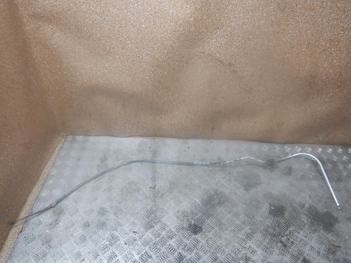 Трос стояночного тормоза