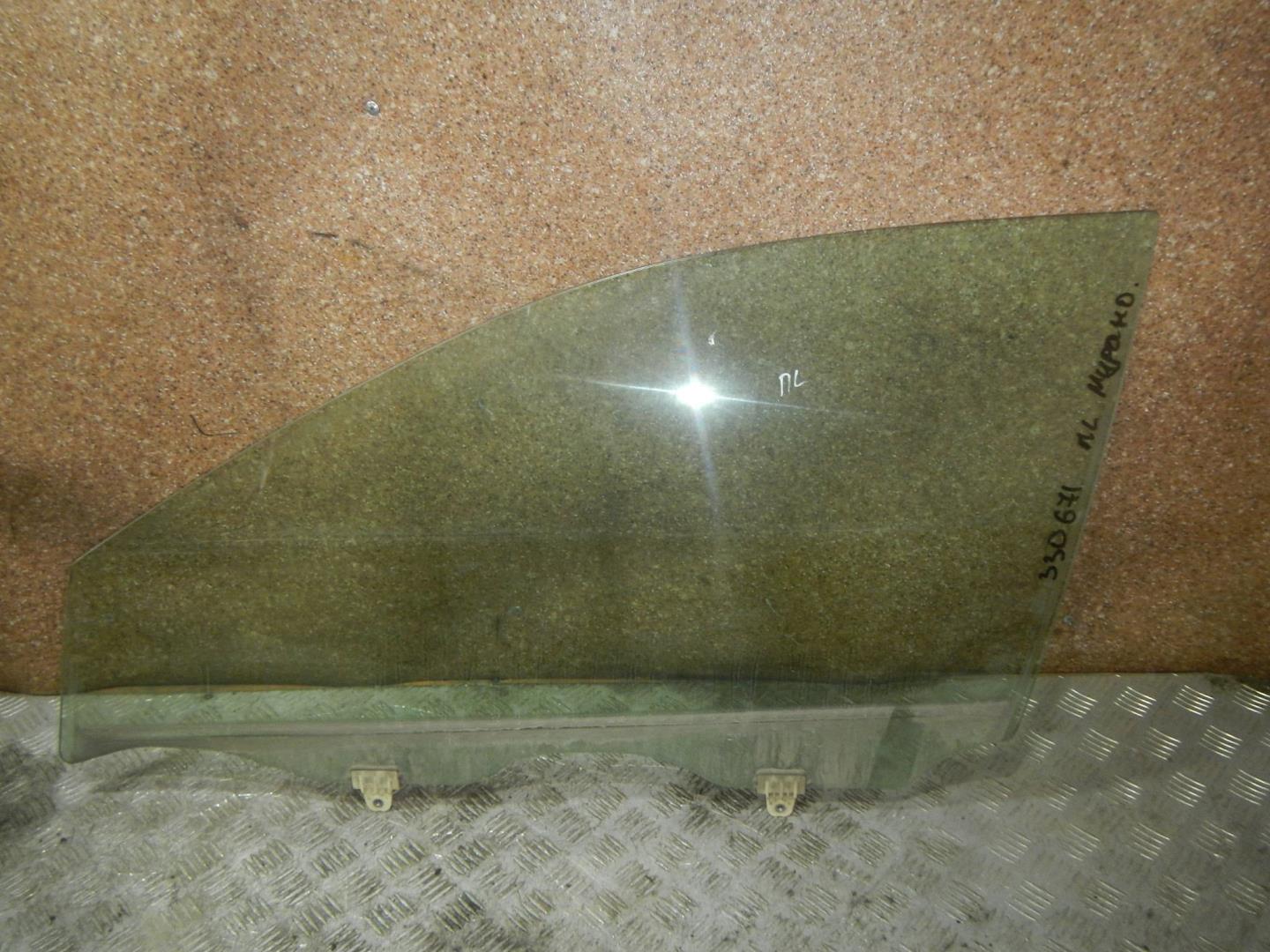 Стекло двери передней левой