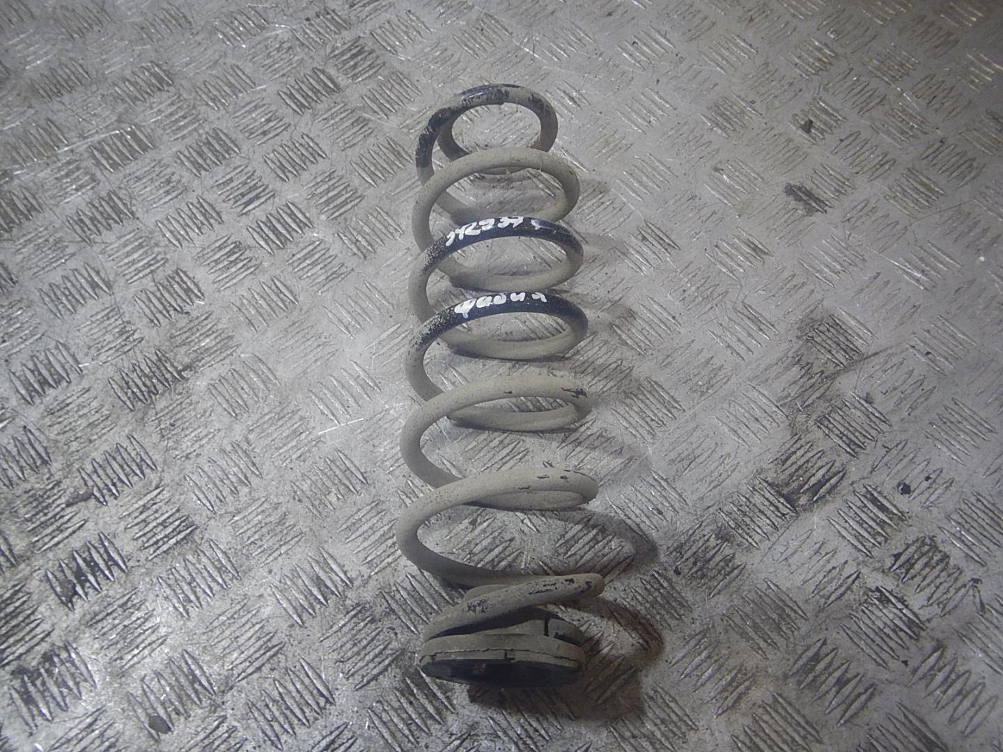 Пружина задняя