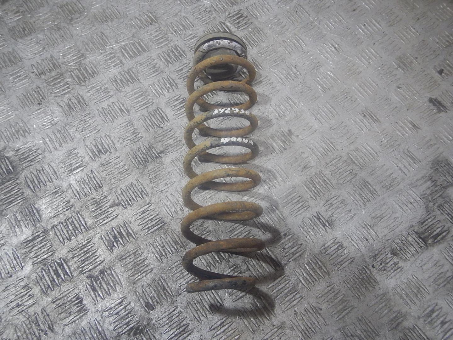 Пружина задняя