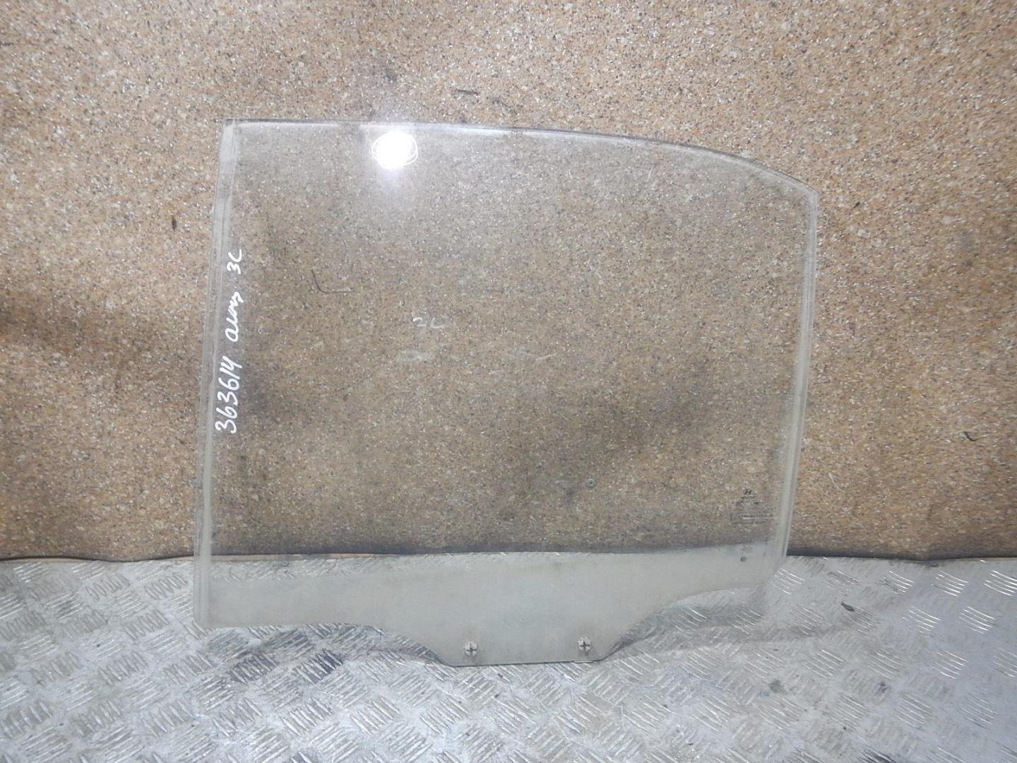 Стекло двери задней левой