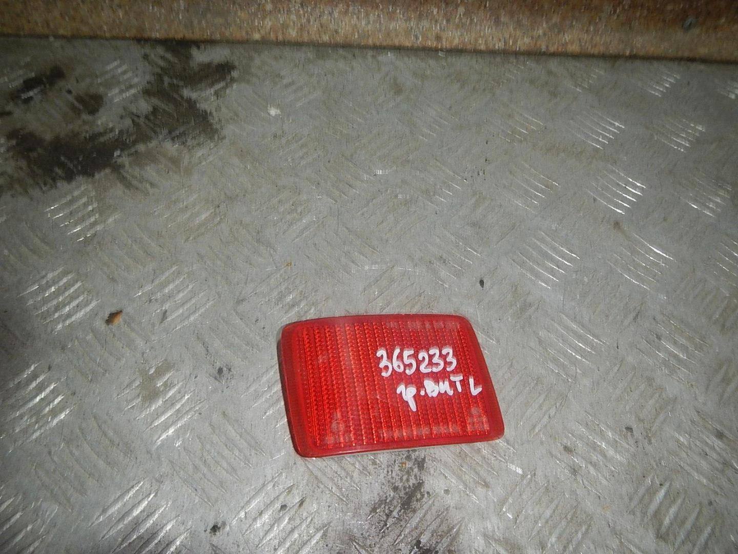 Отражатель в бампер задний левый