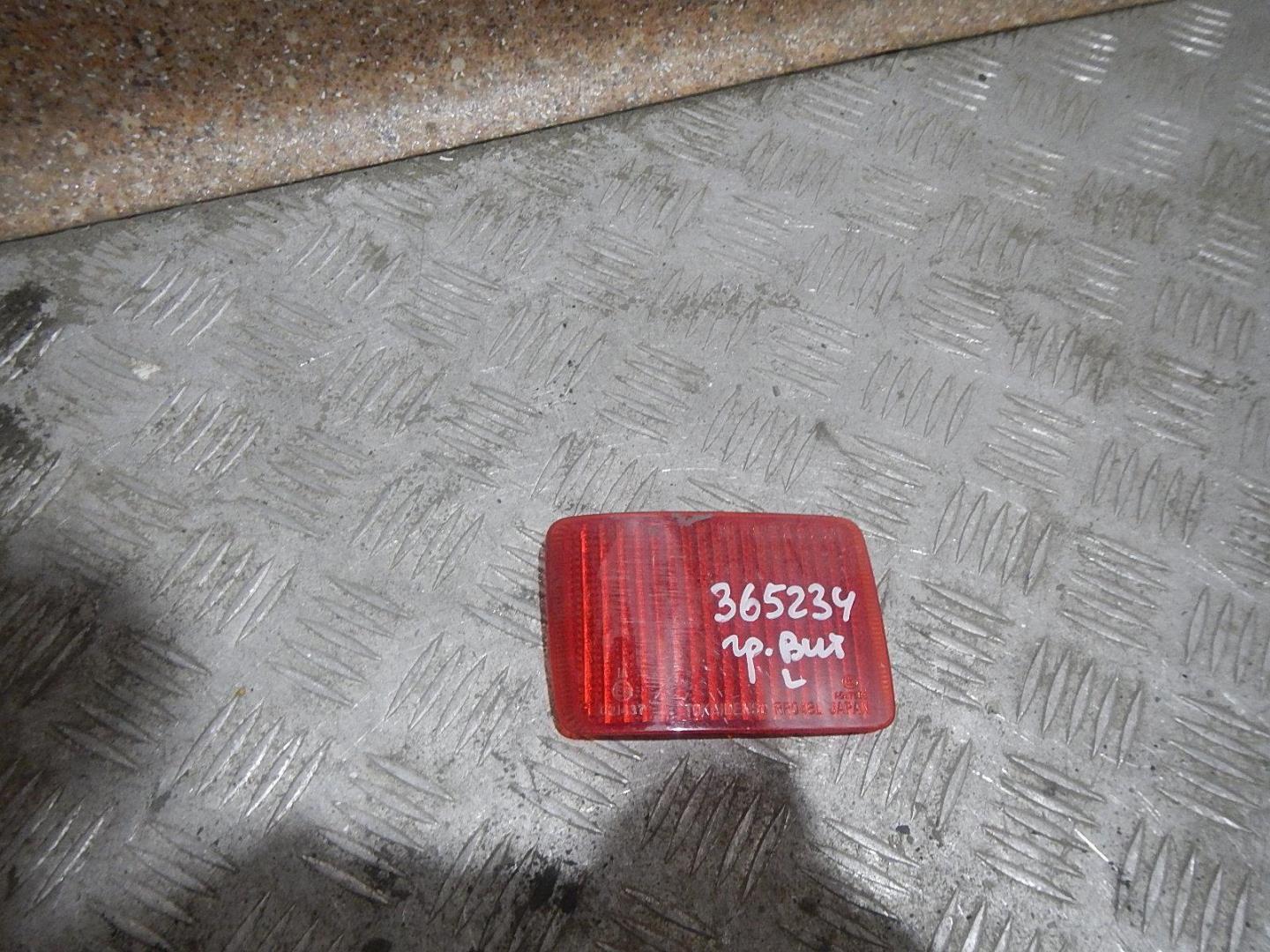 Отражатель в бампер задний левый