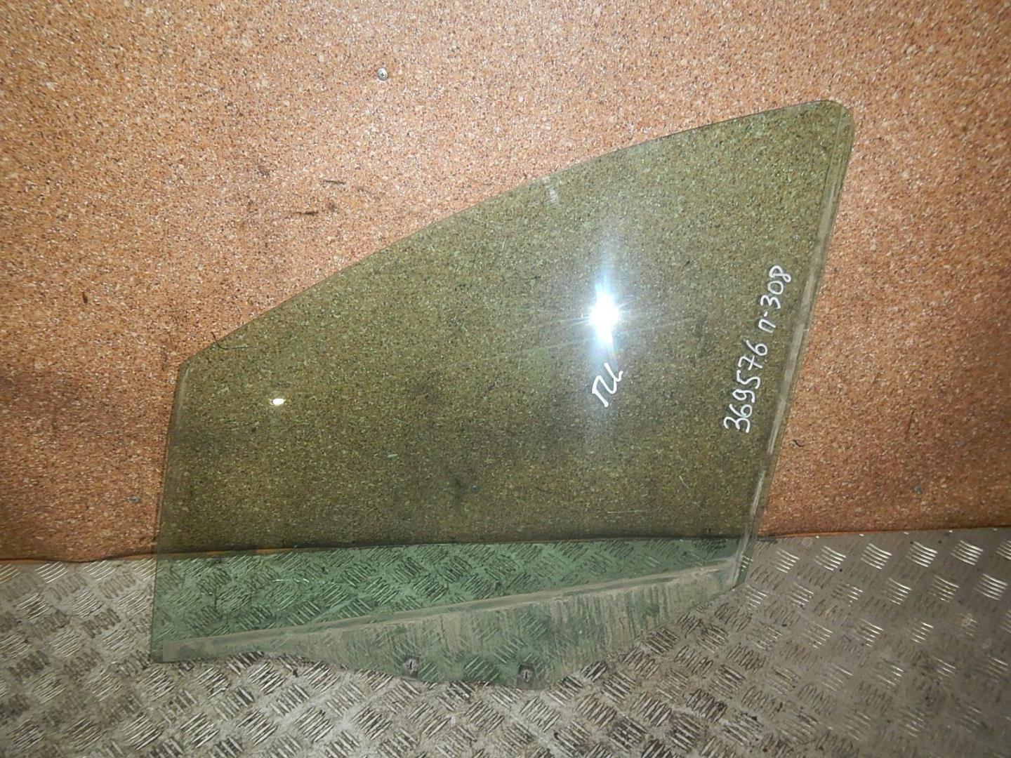 Стекло двери передней левой