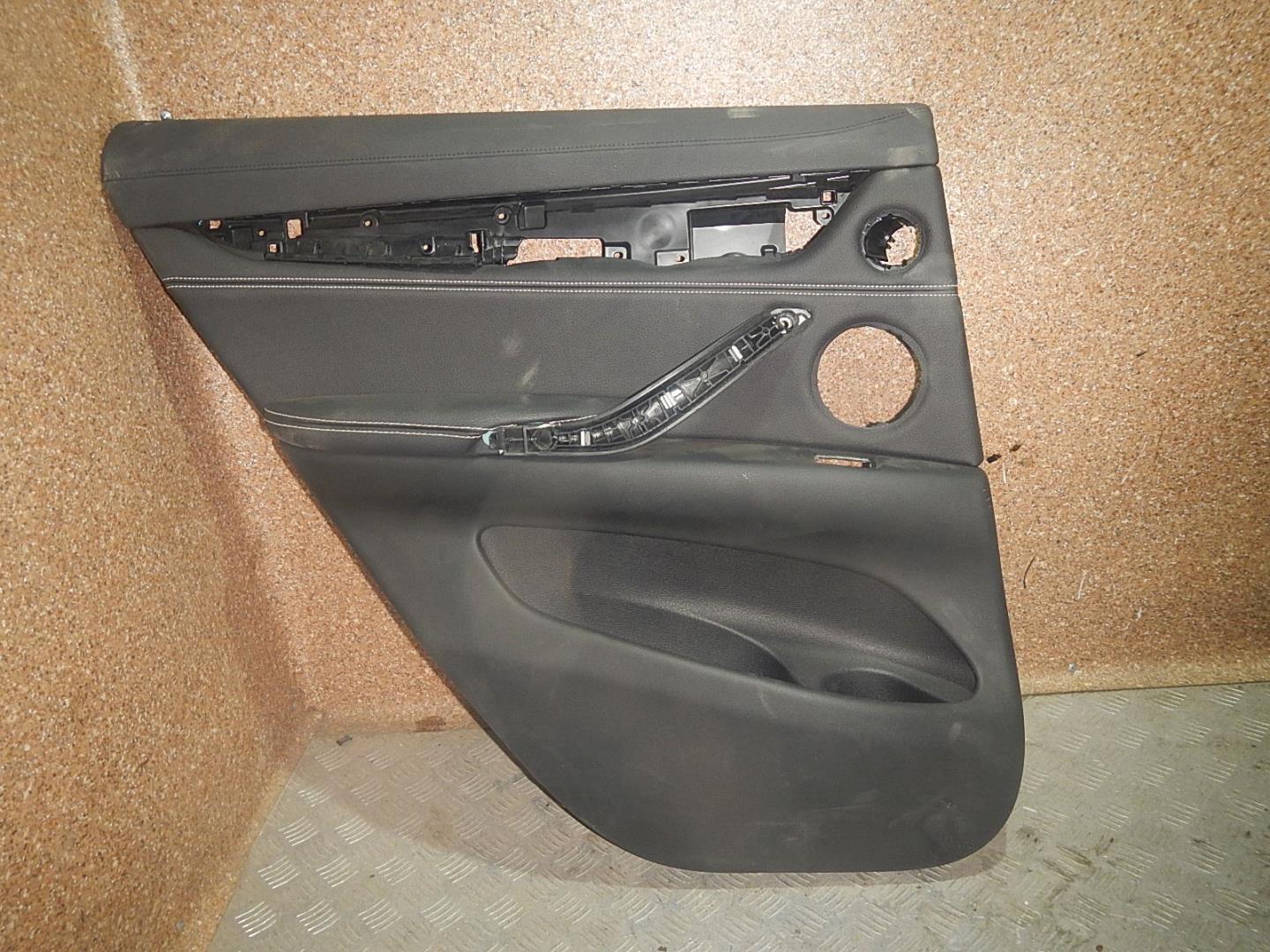 Обшивка двери задней левой