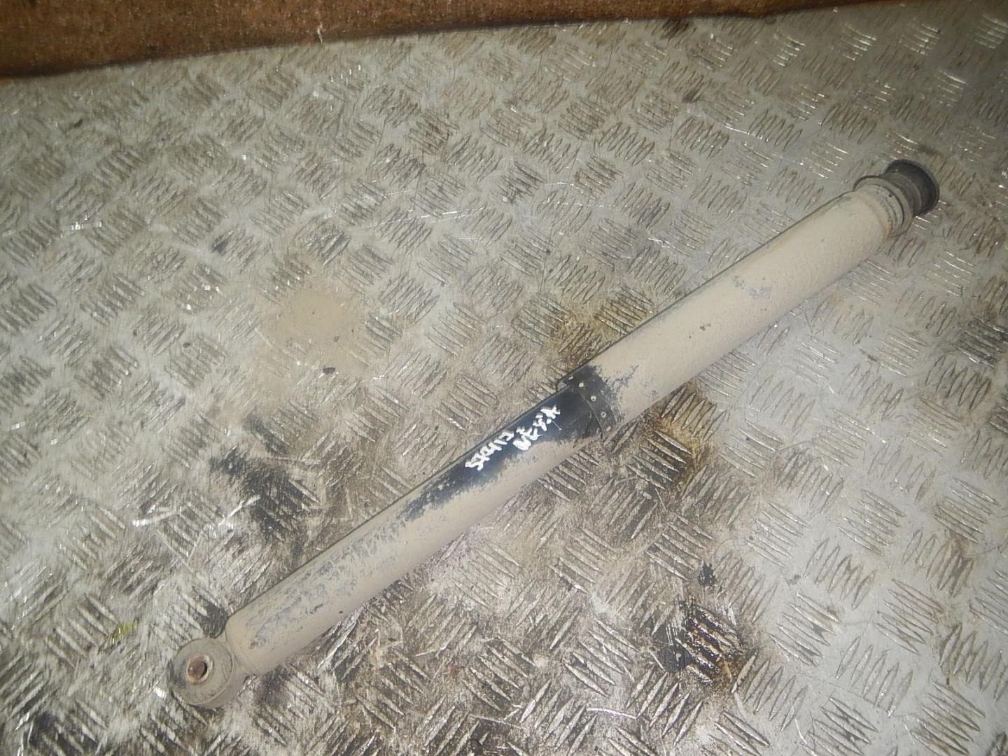 Амортизатор задний левый