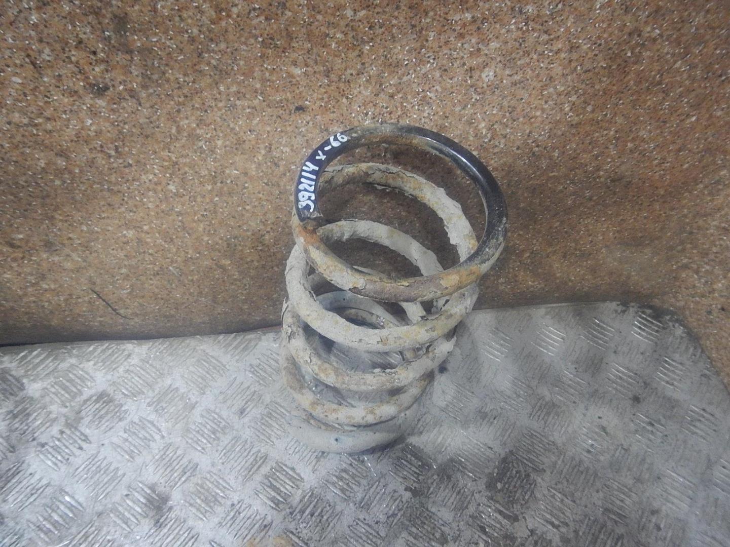 Пружина задняя