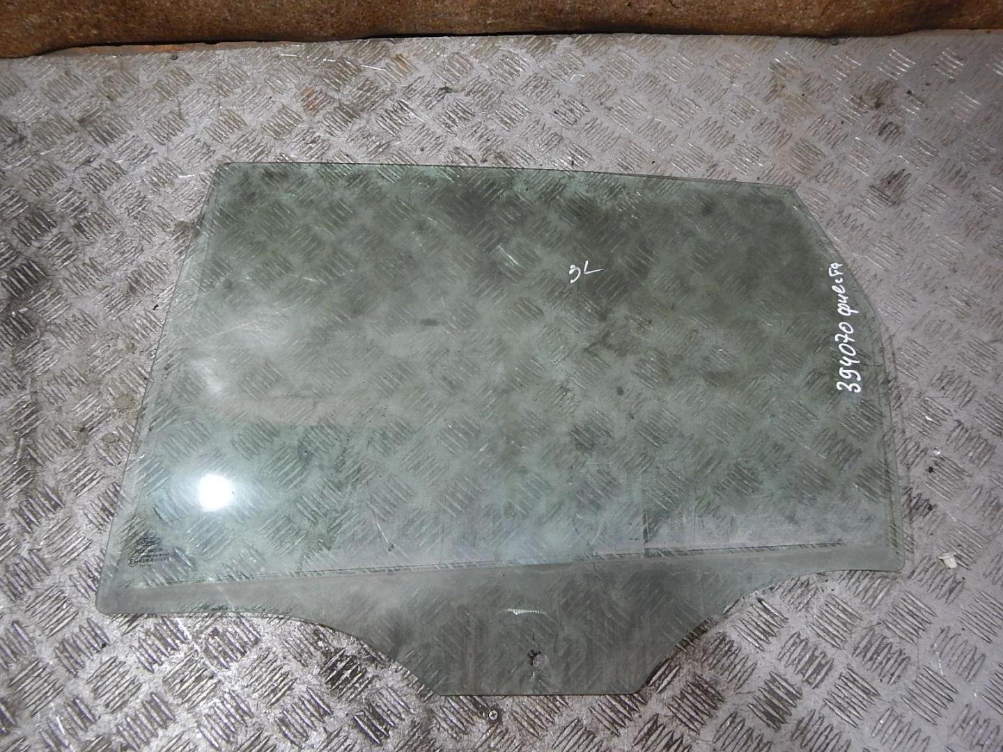 Стекло двери задней левой