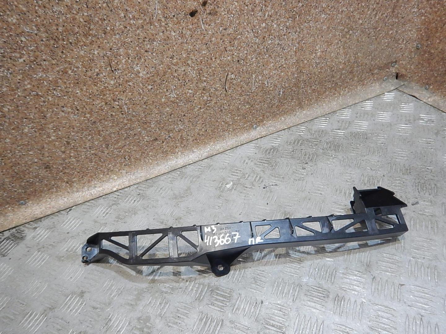 Кронштейн фар правый