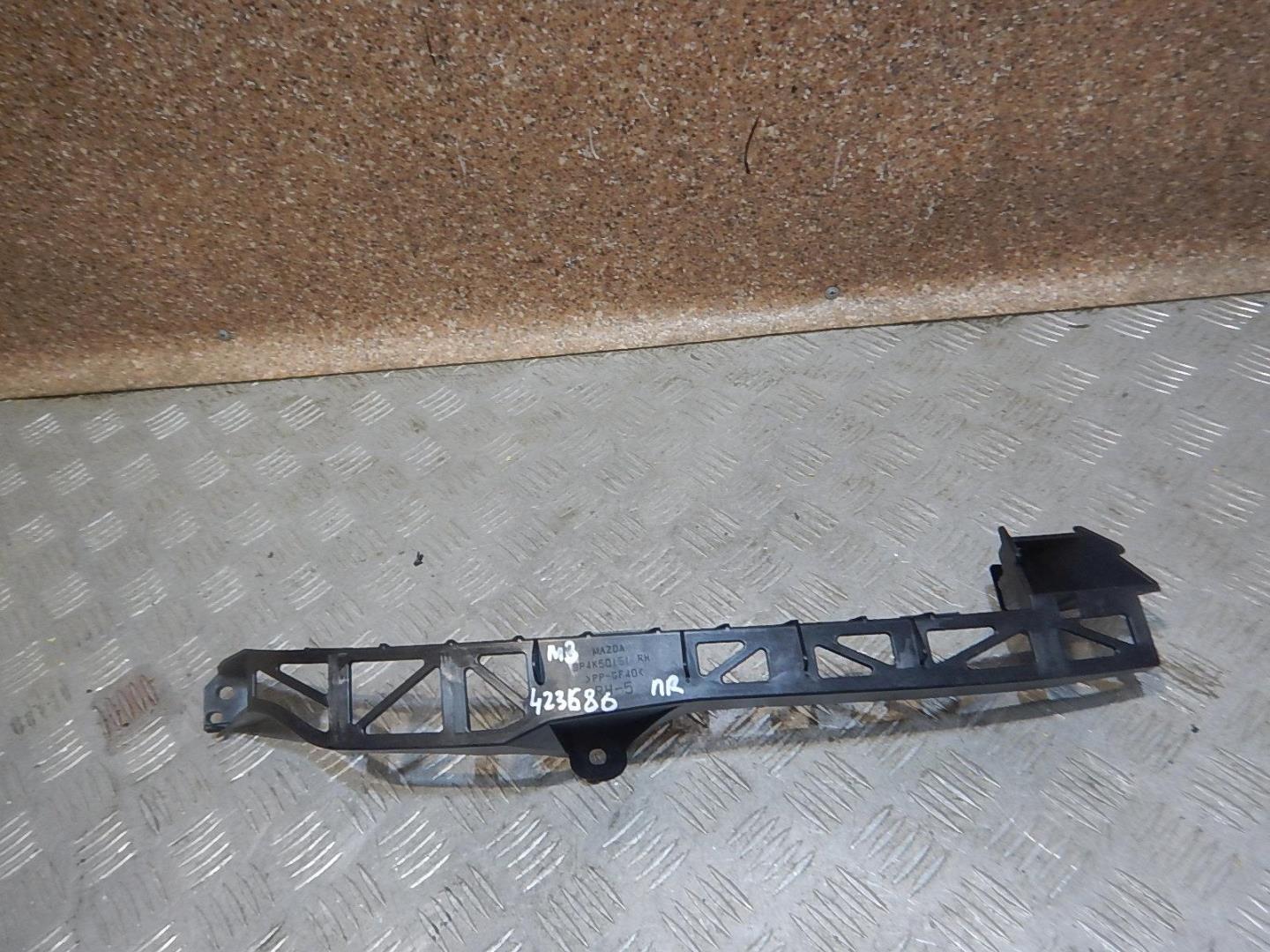 Кронштейн фар правый