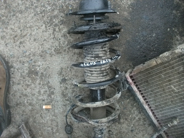 Пружина передняя