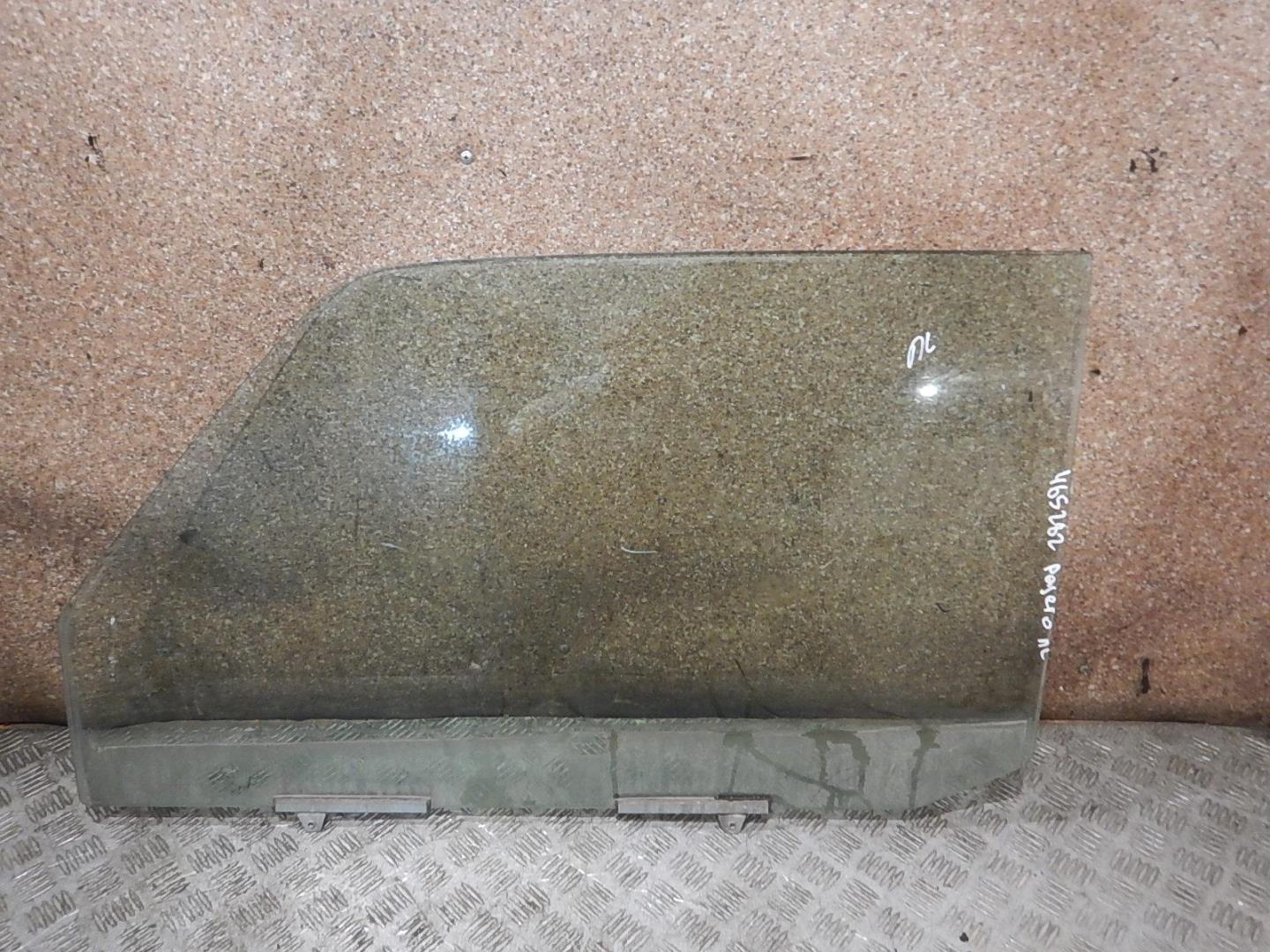 Стекло двери передней левой