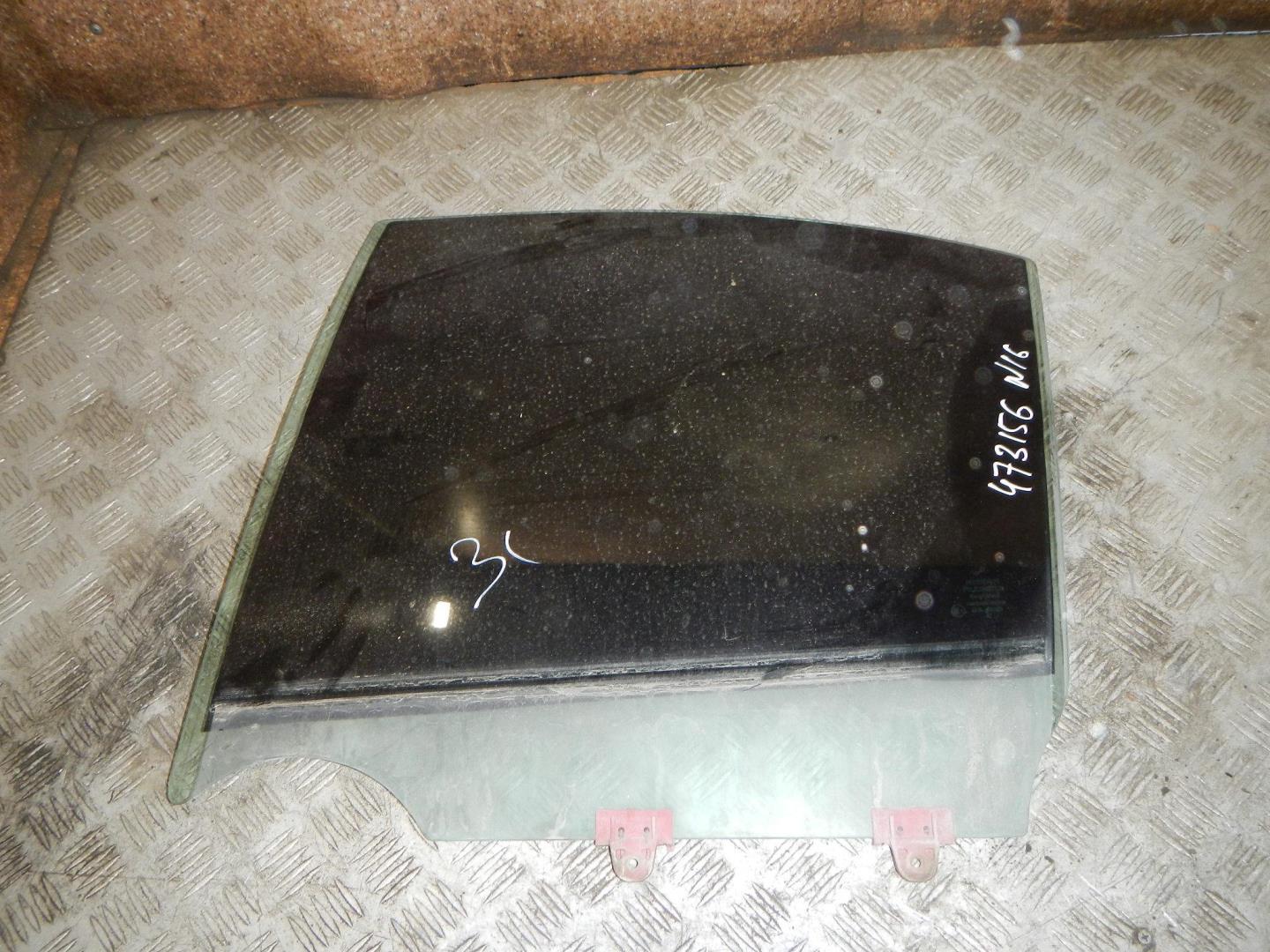 Стекло двери задней левой