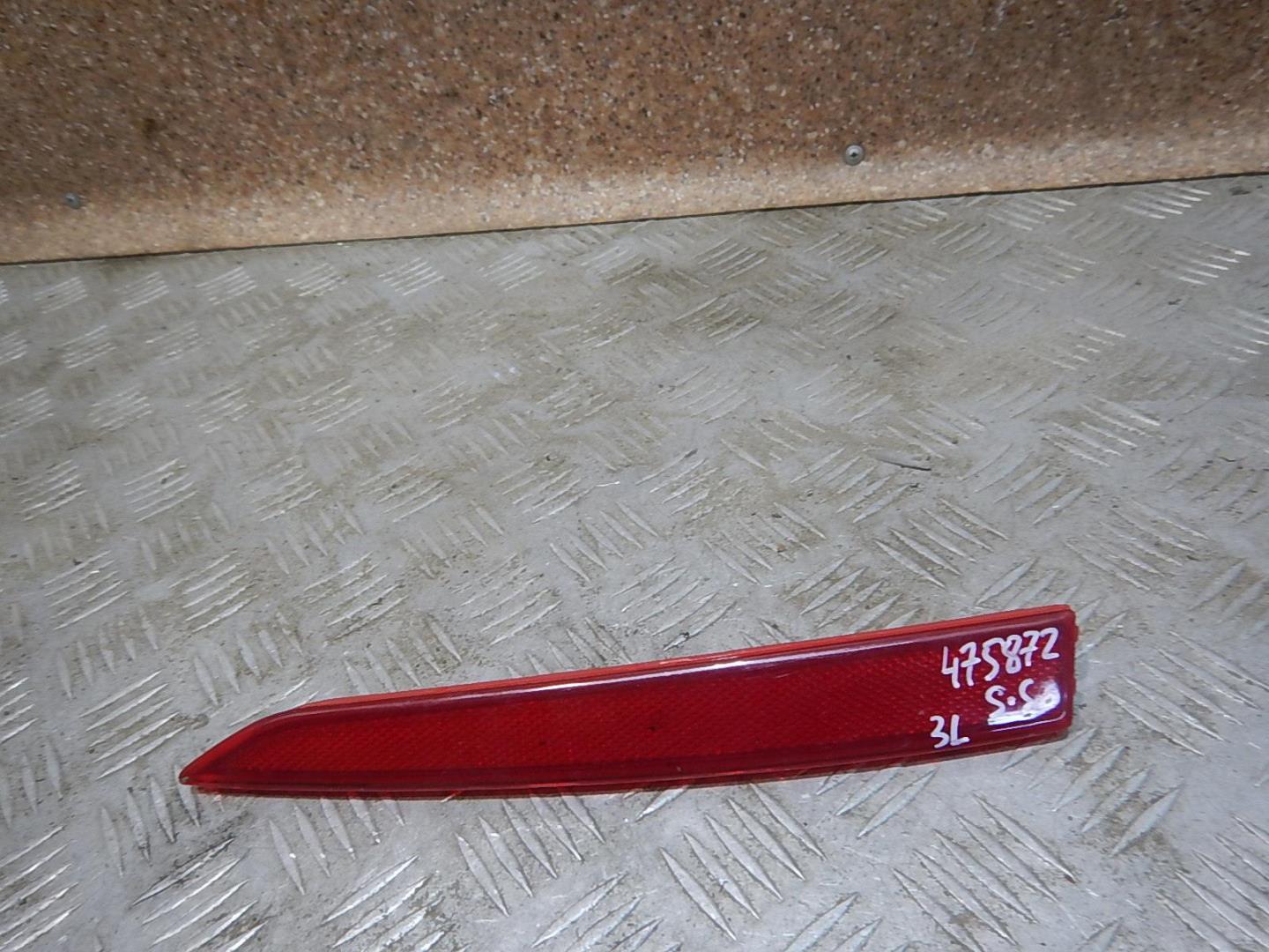 Отражатель в бампер задний левый