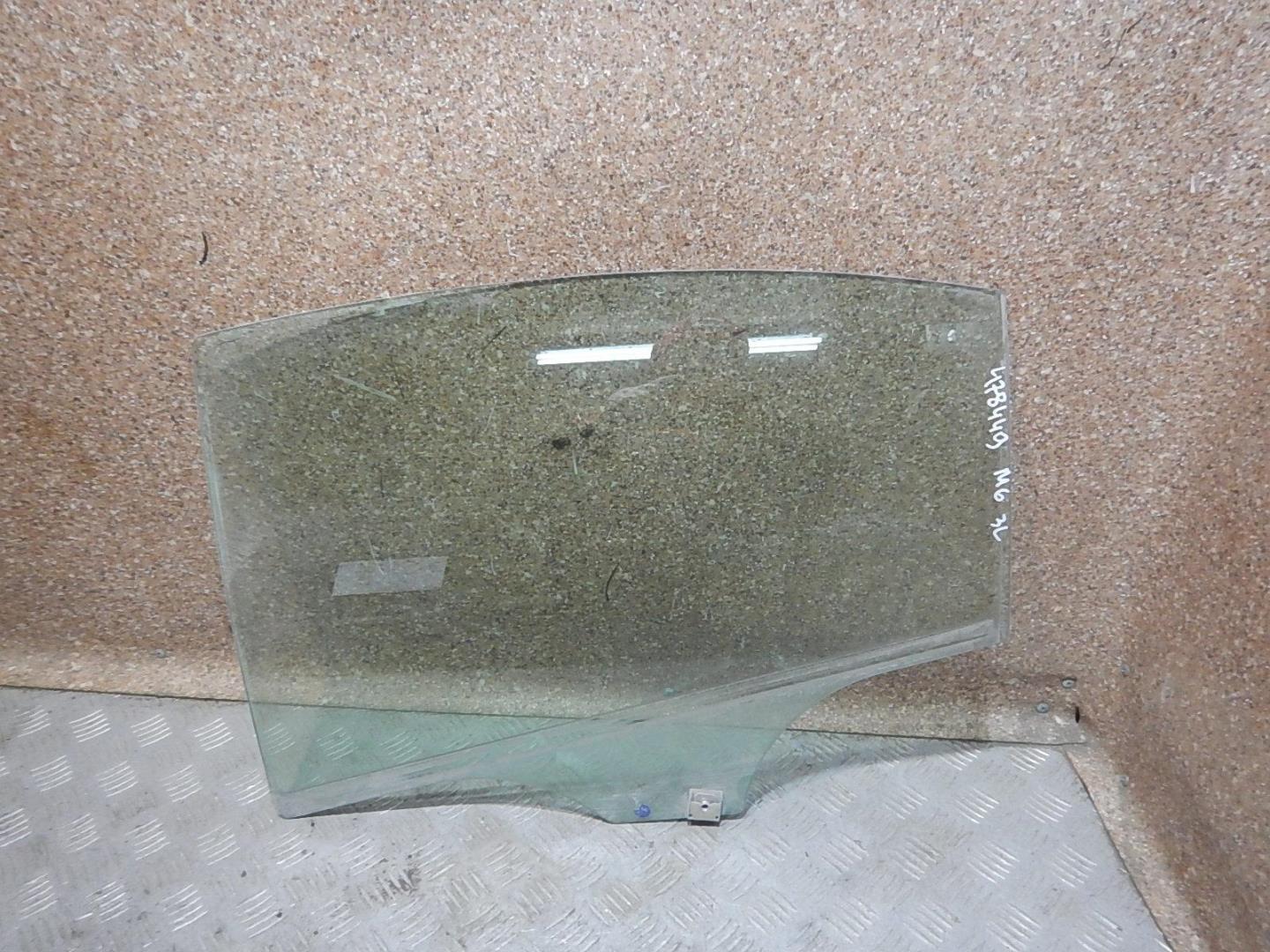 Стекло двери задней левой
