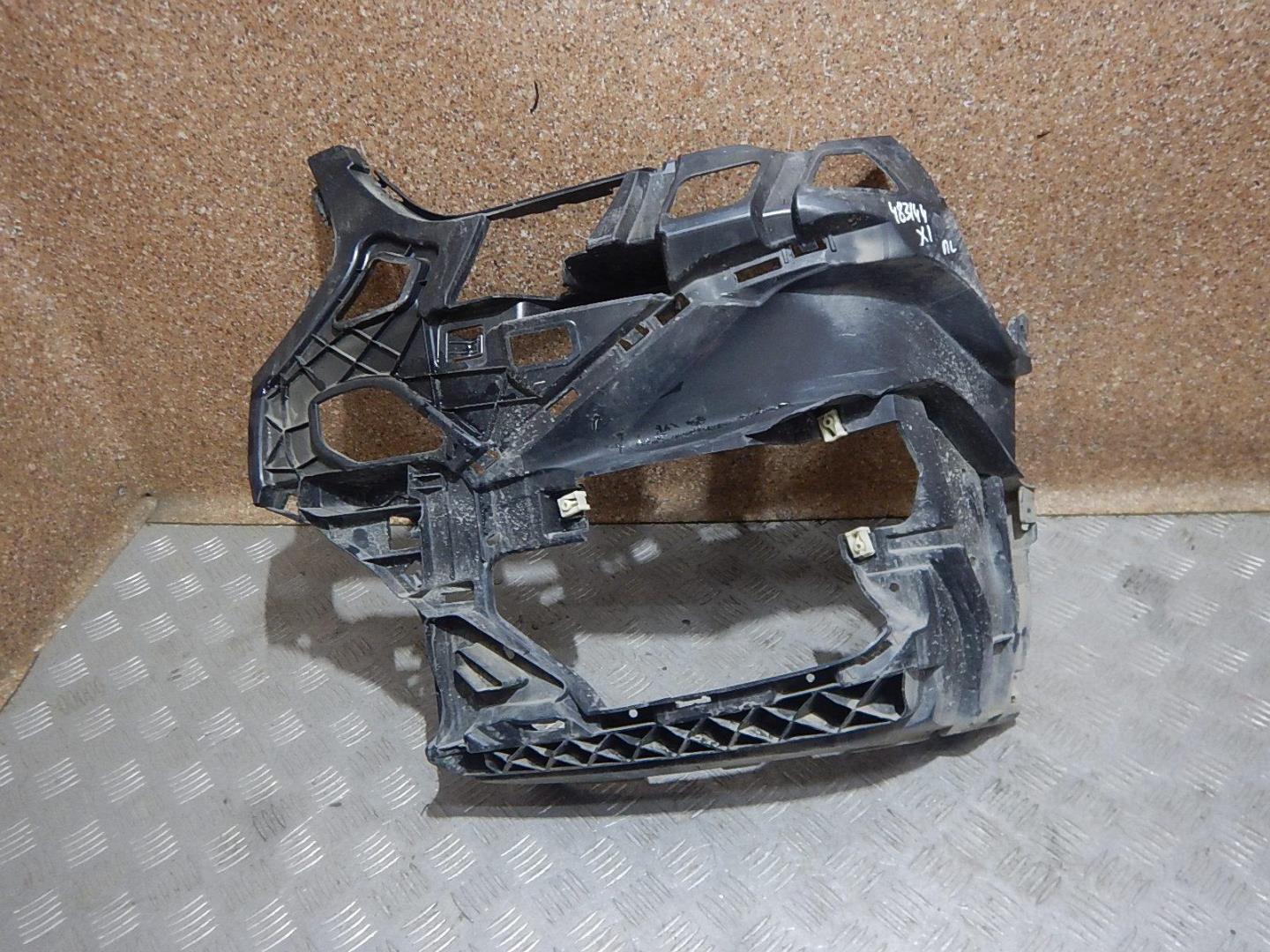 Кронштейн переднего бампера левый