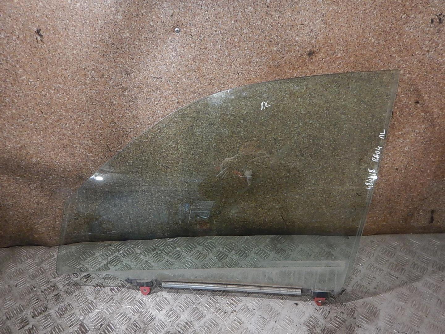 Стекло двери передней левой