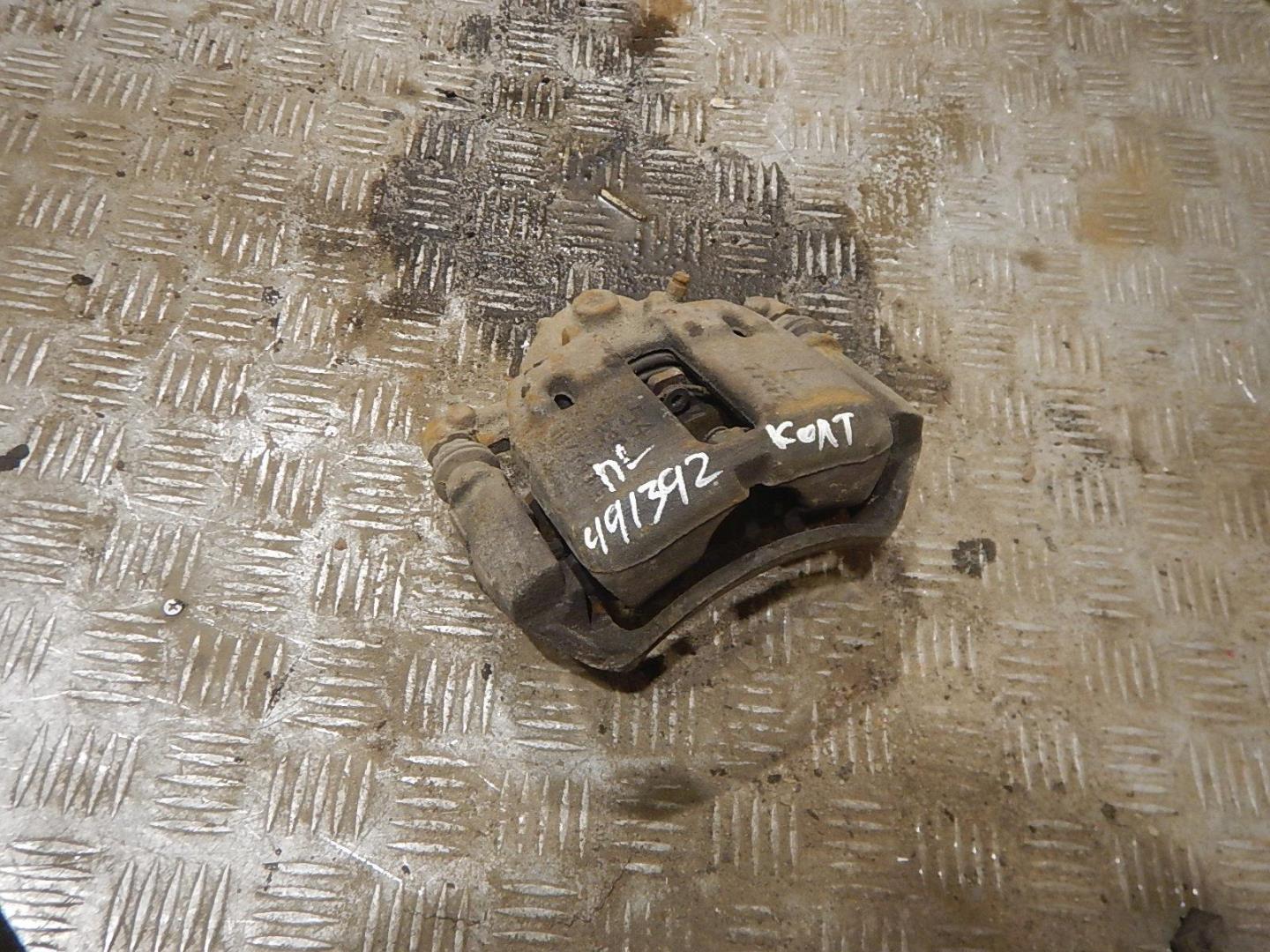 Суппорт передний левый