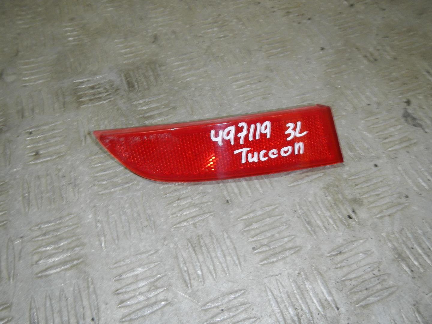 Отражатель в бампер задний левый